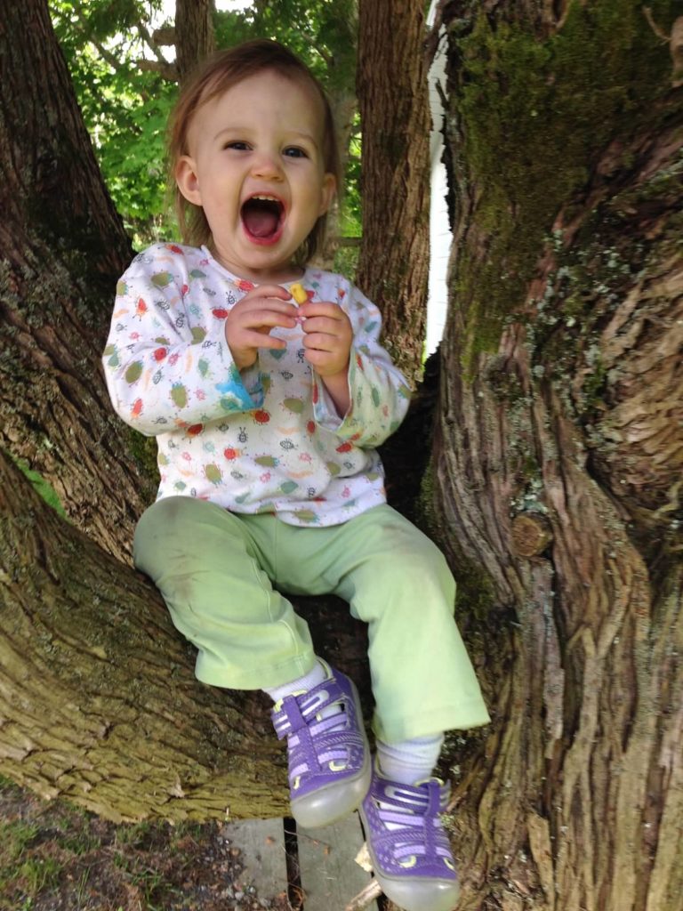 My granddaughter Esme in a tree. Both could still be alive in the 22nd century.