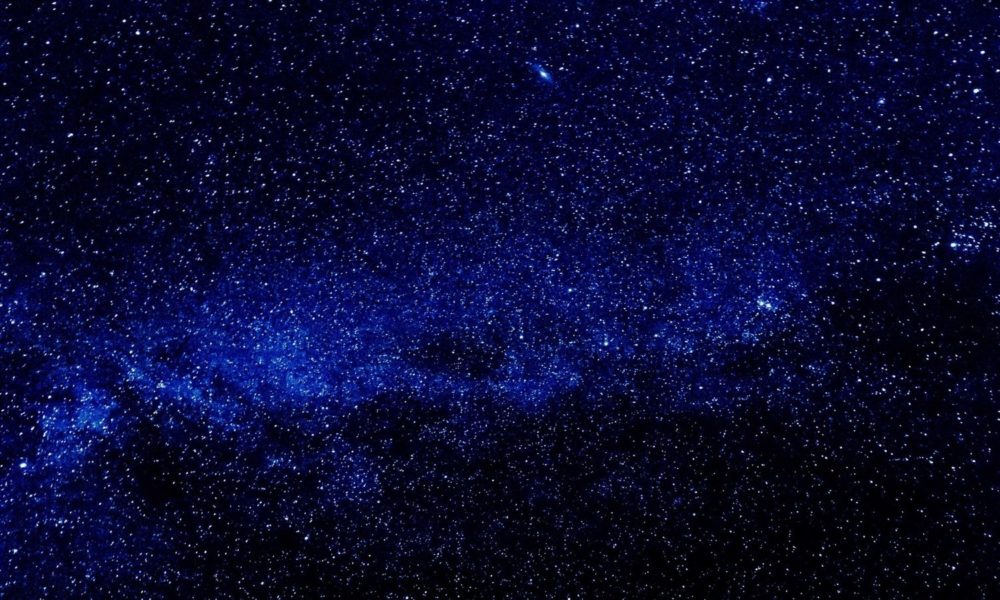 the Milky Way, from Earth: beautiful blue and black space, punctuated by stars