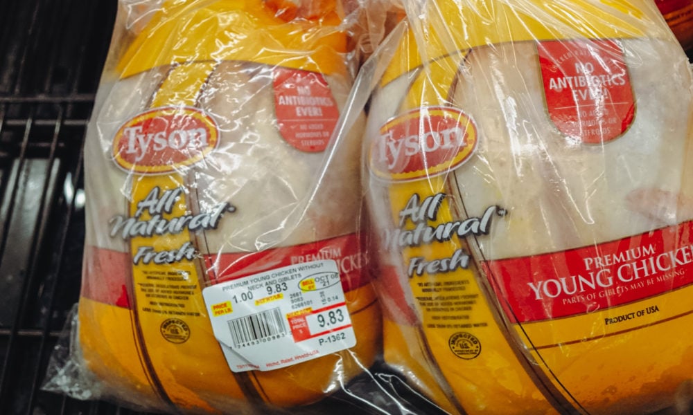 photo showing two packaged whole chickens with Tyson branding on a store shelf