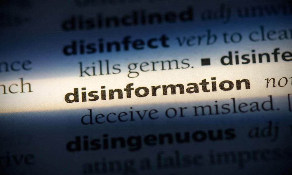 Highlighted definition of disinformation from a a dictionary page