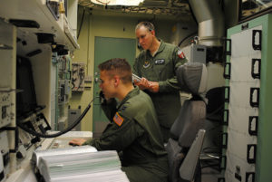 A missileer practices launch procedures under the supervision of a trainer.  Photo: AF GlobalStrike