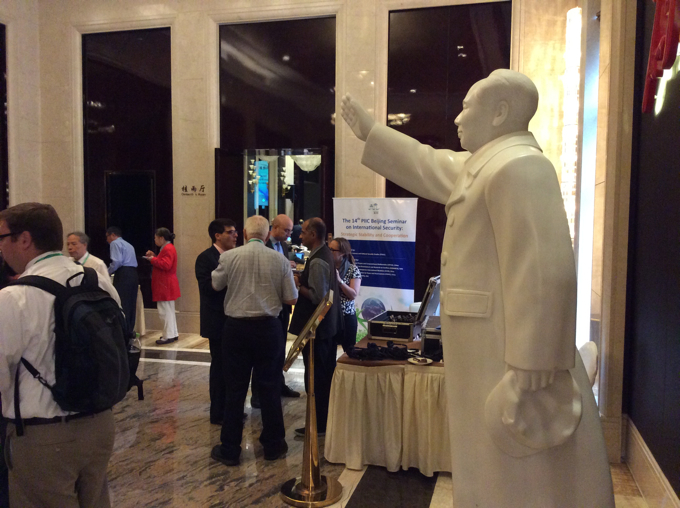 Participants gather for conversation and snacks after a plenary session. 