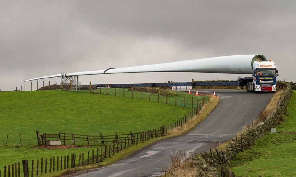 An onshore wind turbine being transported to Muirhall Wind Farm in the UK.