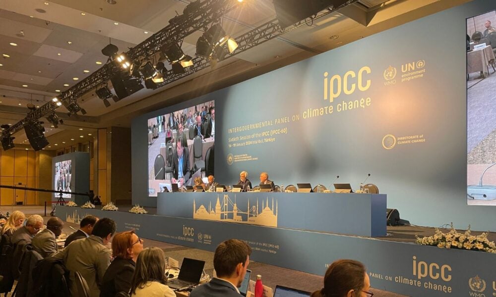 Delegates at the United Nation's opening session of the Intergovernmental Panel on Climate Change (IPCC) seventh assessment cycle watch a presentation.