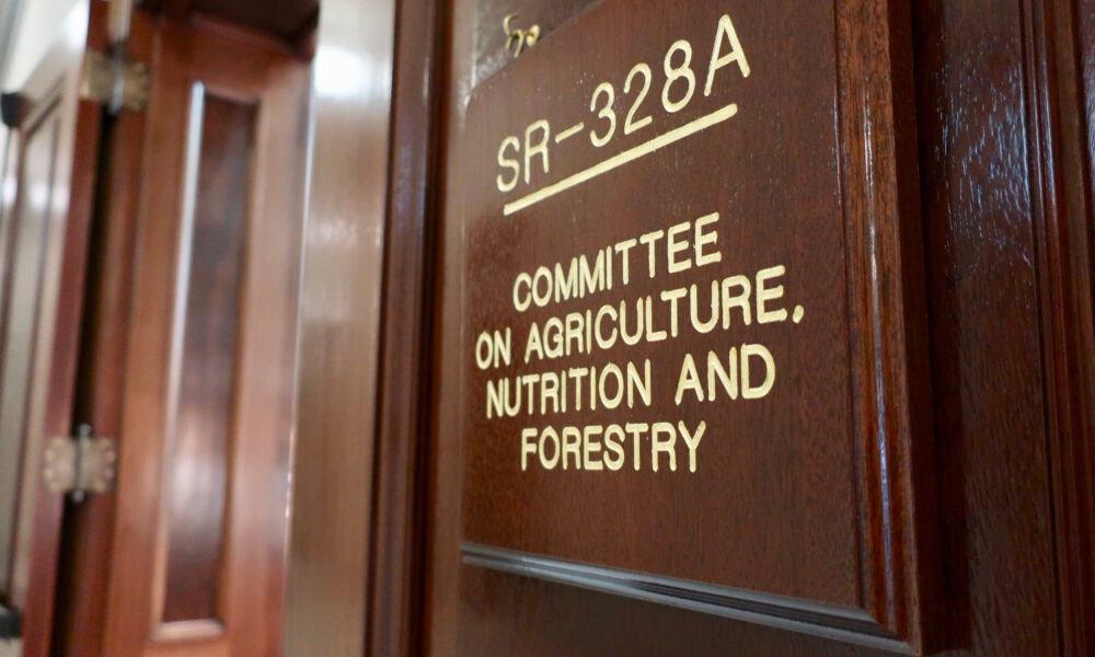 photo of a US Senate door in a dark brown wood; in gold letters a plaque on the door says "Committee on Agriculture, Nutrition and Forestry"