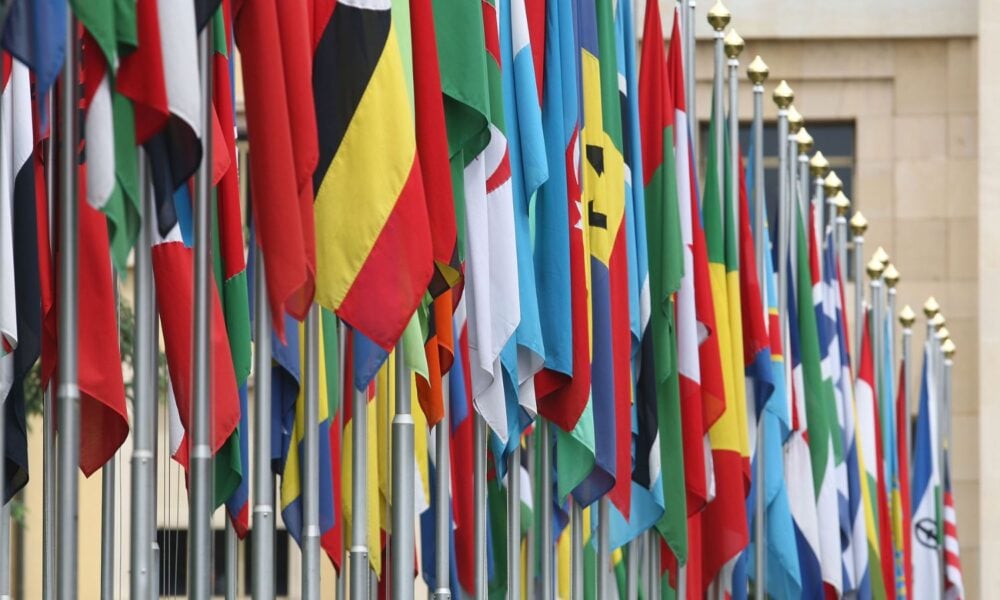 Numerous national flags are seen in front of the United Nations Office at the Palais de Nations in Geneva, Switzerland.